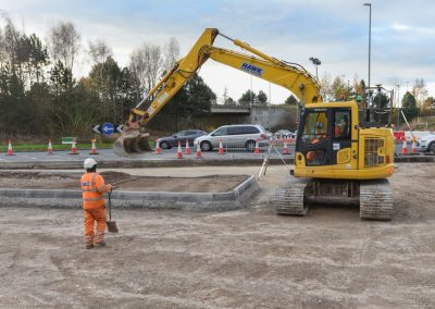 Final trim of traffic islands prior to surfacing(84)